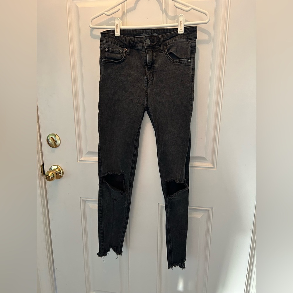 Black high-waisted ripped skinny jeans